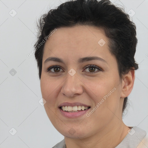 Joyful white young-adult female with short  brown hair and brown eyes