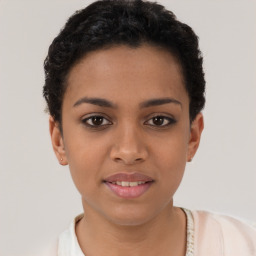 Joyful latino young-adult female with short  brown hair and brown eyes