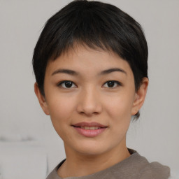 Joyful asian young-adult female with short  black hair and brown eyes