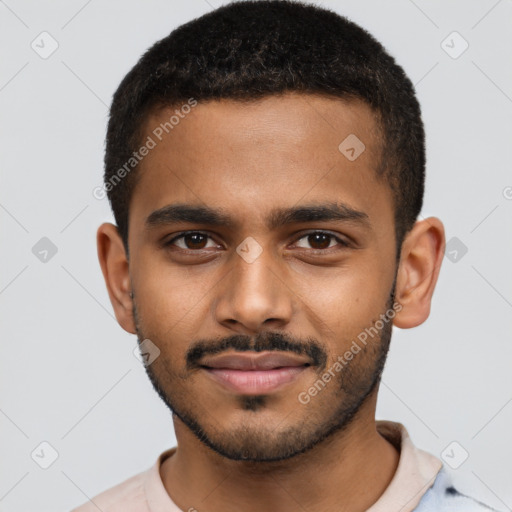 Joyful black young-adult male with short  brown hair and brown eyes