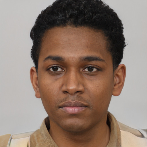 Neutral latino young-adult male with short  brown hair and brown eyes