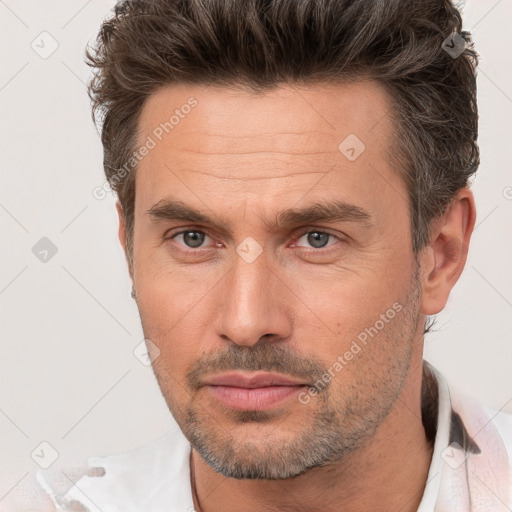 Neutral white adult male with short  brown hair and brown eyes