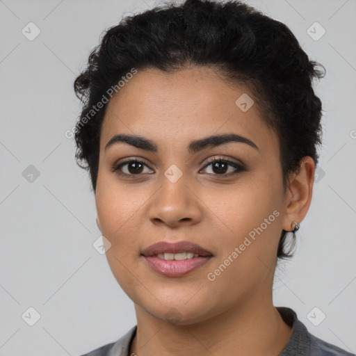 Joyful latino young-adult female with short  black hair and brown eyes