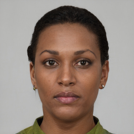Neutral black young-adult female with short  brown hair and brown eyes