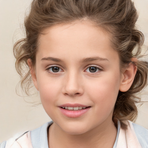 Joyful white child female with medium  brown hair and brown eyes