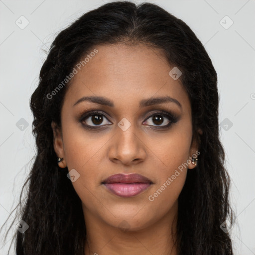 Joyful black young-adult female with long  brown hair and brown eyes