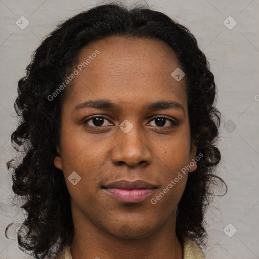 Joyful black young-adult female with long  brown hair and brown eyes