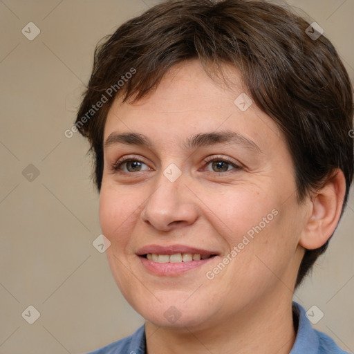 Joyful white adult female with medium  brown hair and brown eyes