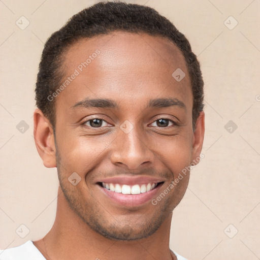 Joyful black young-adult male with short  brown hair and brown eyes