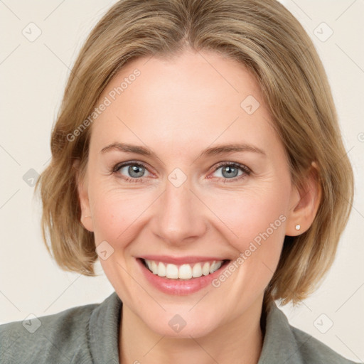 Joyful white young-adult female with medium  brown hair and blue eyes