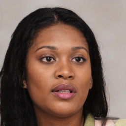 Joyful asian young-adult female with long  brown hair and brown eyes