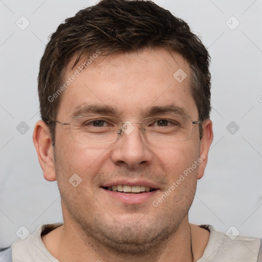 Joyful white adult male with short  brown hair and brown eyes