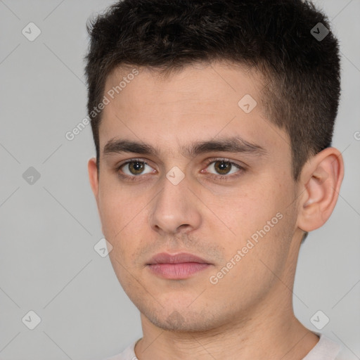 Neutral white young-adult male with short  brown hair and brown eyes