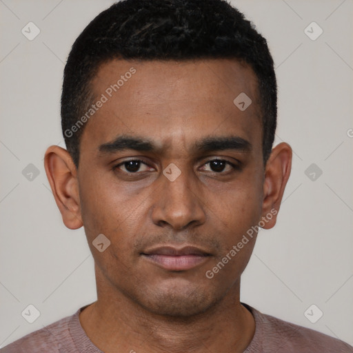 Neutral latino young-adult male with short  black hair and brown eyes