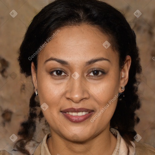 Joyful latino adult female with medium  brown hair and brown eyes