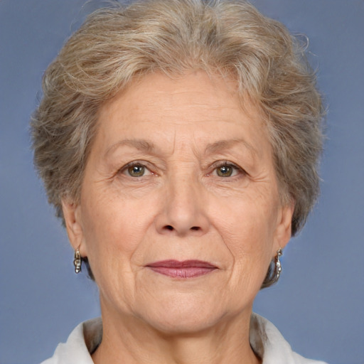 Joyful white middle-aged female with short  brown hair and brown eyes