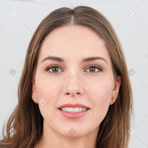 Joyful white young-adult female with long  brown hair and grey eyes