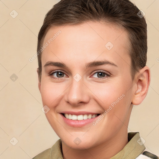 Joyful white young-adult female with short  brown hair and brown eyes