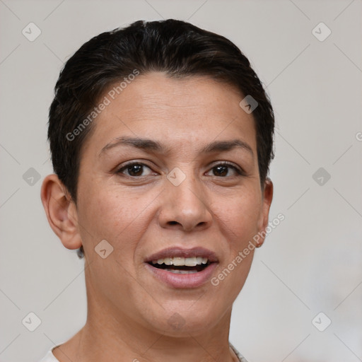 Joyful white adult female with short  brown hair and brown eyes