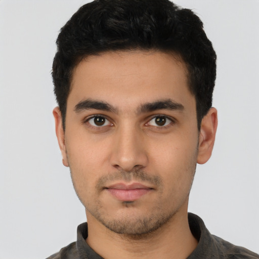 Neutral latino young-adult male with short  black hair and brown eyes