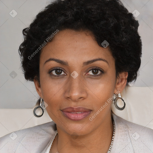 Joyful black young-adult female with short  brown hair and brown eyes