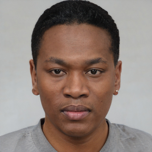 Neutral black young-adult male with short  black hair and brown eyes
