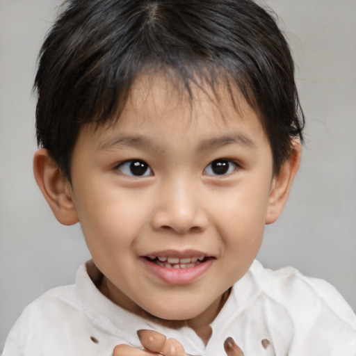Joyful white child female with short  brown hair and brown eyes