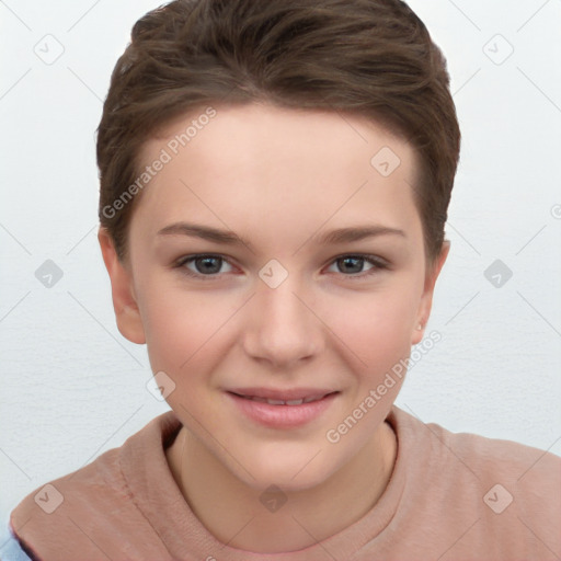 Joyful white child female with short  brown hair and brown eyes