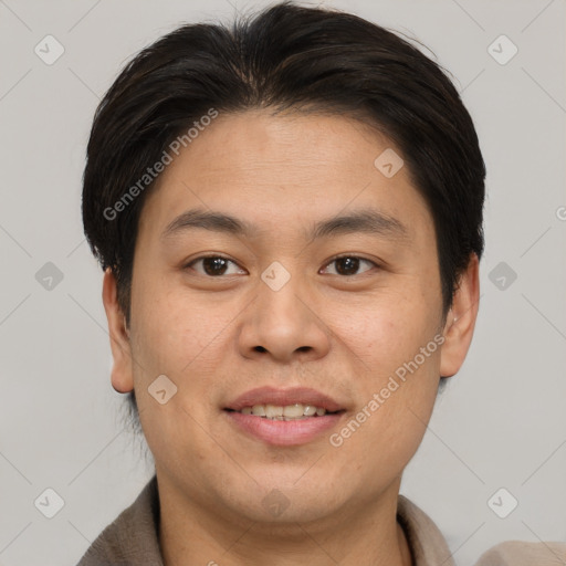 Joyful asian young-adult male with short  brown hair and brown eyes