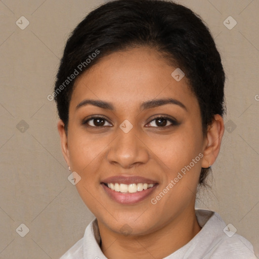 Joyful latino young-adult female with short  brown hair and brown eyes