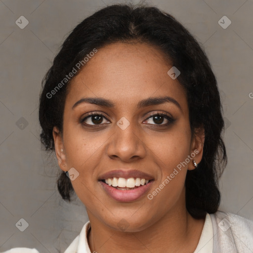 Joyful black young-adult female with medium  brown hair and brown eyes