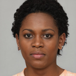 Neutral black young-adult female with short  brown hair and brown eyes