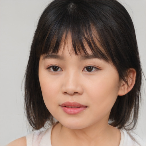 Neutral asian child female with medium  brown hair and brown eyes