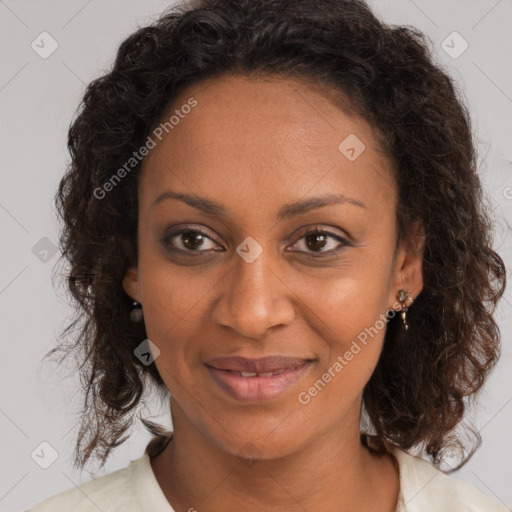 Joyful black young-adult female with medium  brown hair and brown eyes