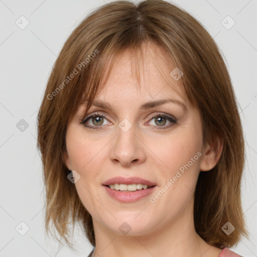 Joyful white young-adult female with medium  brown hair and blue eyes