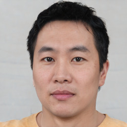 Neutral asian young-adult male with short  black hair and brown eyes