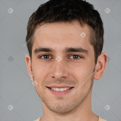 Joyful white young-adult male with short  brown hair and brown eyes