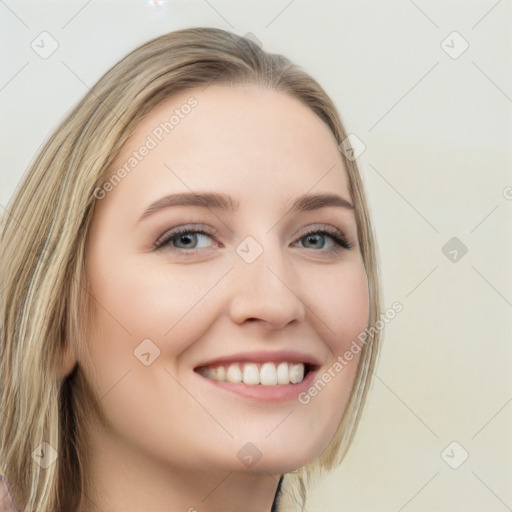 Joyful white young-adult female with long  brown hair and green eyes