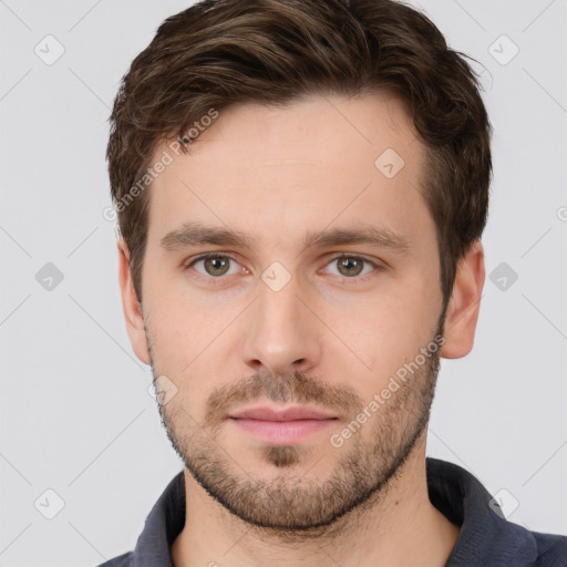 Neutral white young-adult male with short  brown hair and brown eyes