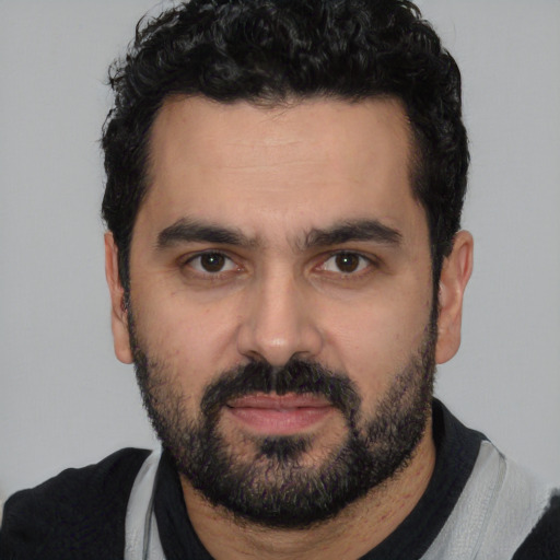 Neutral white young-adult male with short  black hair and brown eyes