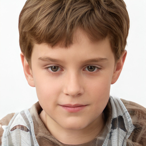 Joyful white child male with short  brown hair and brown eyes