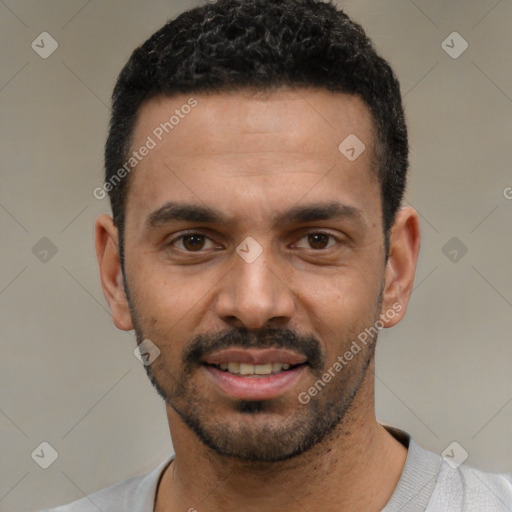 Joyful white young-adult male with short  black hair and brown eyes