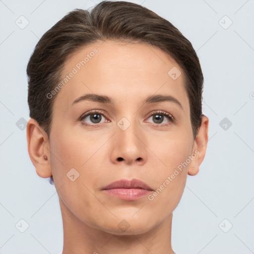 Neutral white young-adult female with short  brown hair and brown eyes