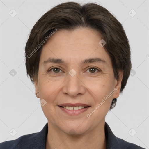 Joyful white adult female with short  brown hair and brown eyes