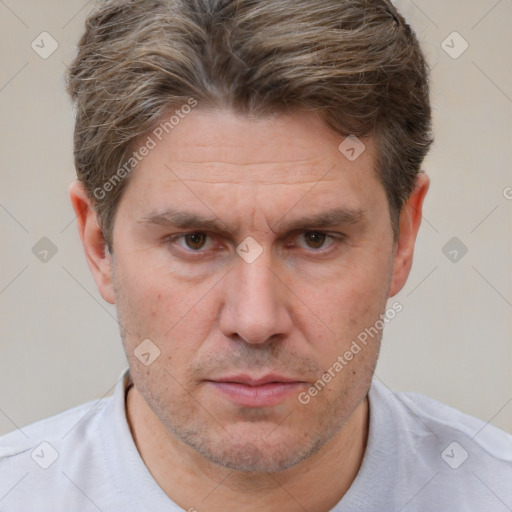 Neutral white adult male with short  brown hair and brown eyes