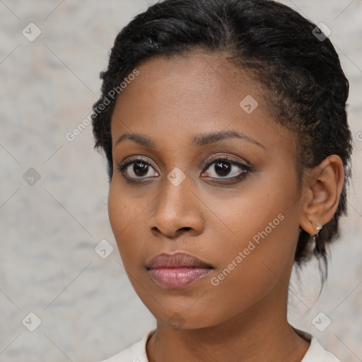 Neutral black young-adult female with short  brown hair and brown eyes