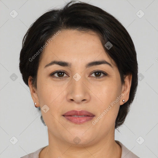 Joyful white adult female with short  brown hair and brown eyes