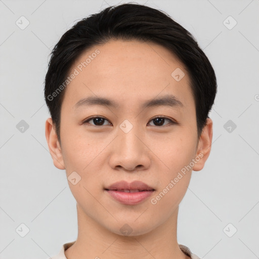 Joyful asian young-adult male with short  black hair and brown eyes