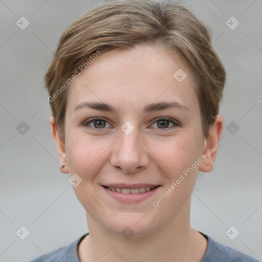 Joyful white young-adult female with short  brown hair and grey eyes