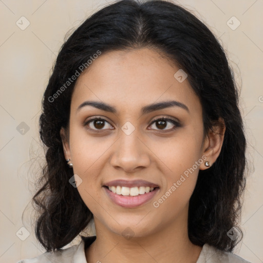 Joyful latino young-adult female with long  brown hair and brown eyes